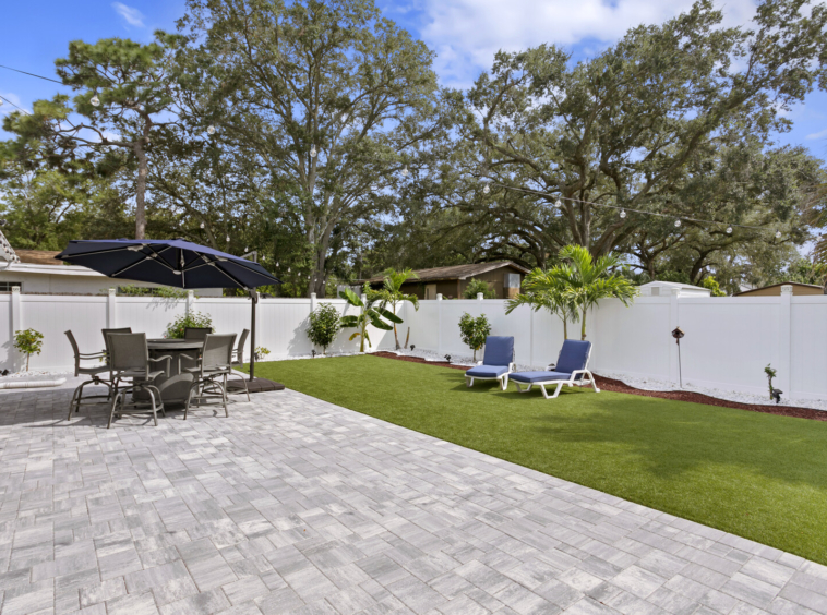 Beautifully Landscaped Backyard with Artificial Turf in Seminole Heights