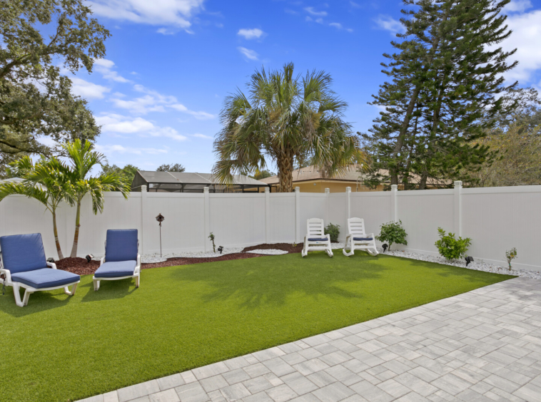 Pavers create a siting area in South Seminole Heights Home 608 Emma by Fadal Real Estate Tampa